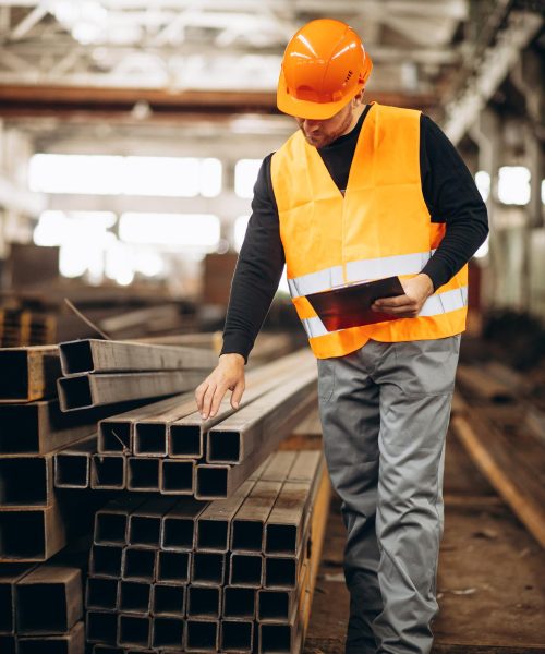 worker-steel-factory-checking-material worker-steel-factory-checking-material